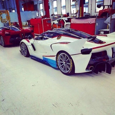 White Ferrari FXX K captioned Right behind the Red One